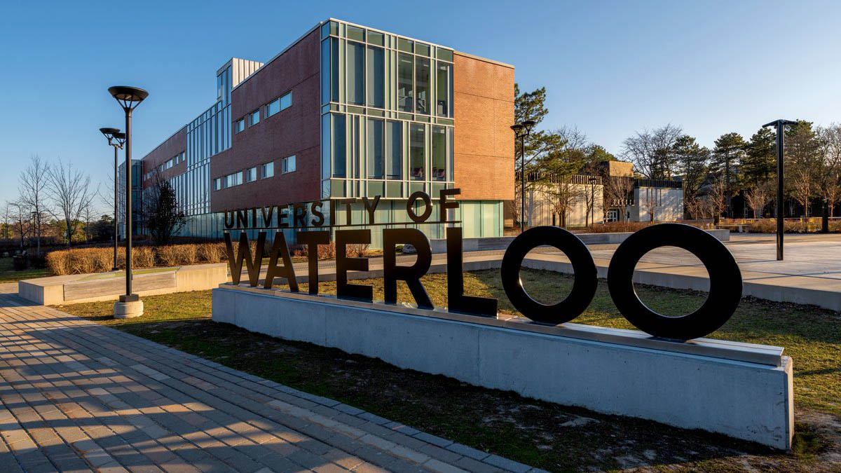 A building at the University of Waterloo with signage stating: University of Waterloo