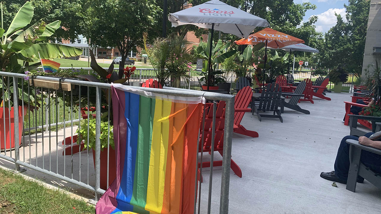 The Oasis patio at Fanshawe College, with a Pride flag.