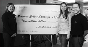 Current FSU President Melissa Smart presents the $3 million donation with past presidents Crystal Boyd and Keith Allan.