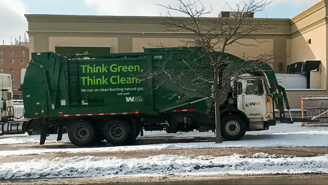 A photo of a city garbage truck