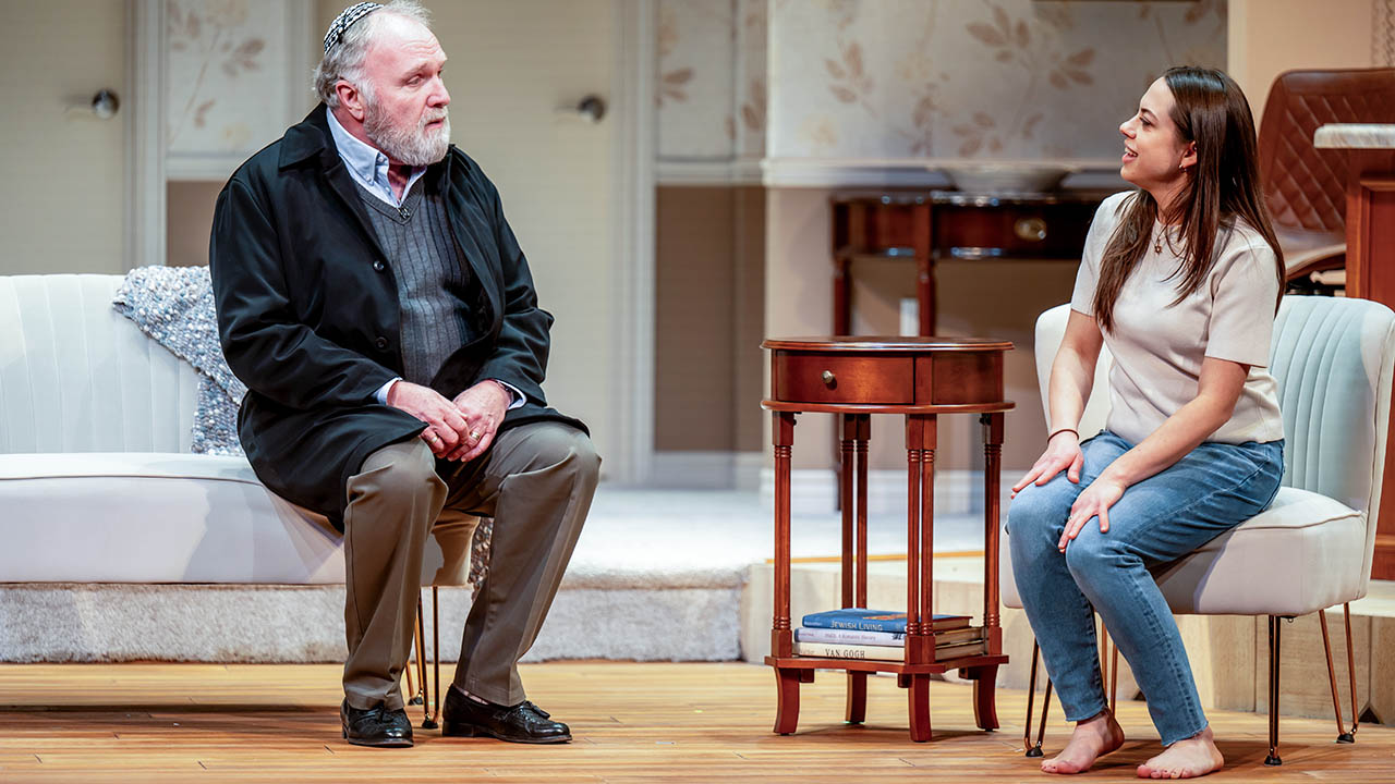 Photo of two actors on stage in the Grand Theatre's In Seven Days.