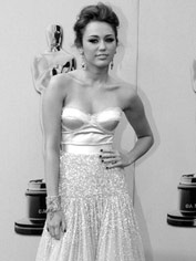 Miley Cyrus wear a sexy boudoir style gown from Jenny Packham at the
Oscars. Cyrus' glam gown made Aimee Brothman's list of favourite looks.