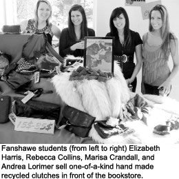 Fanshawe students (from left to right) Elizabeth Harris, Rebecca Collins, Marisa Crandall, and Andrea Lorimer sell one-of-a-kind hand made recycled clutches in front of the bookstore.