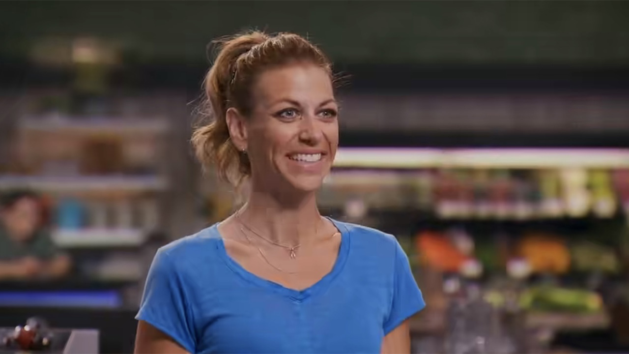 A screenshot of Chef Erin Circelli-Russell competing on Guy's Grocery Games.