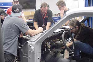 Fanshawe faculty and students restore a 1967 Ford Falcon for Fanshawe's 50th anniversary photos