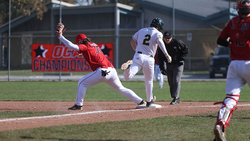 A photo of Falcons first and third baseman, Jamie Chopping-Lawlor making a catch at a baseball game