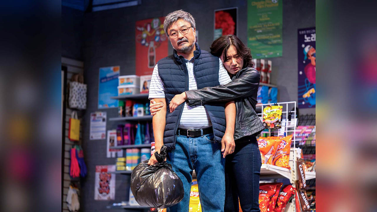 A photo of Ins Choi and Kelly J Seo on stage in Kim's Convenience