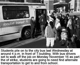 students wait for a bus