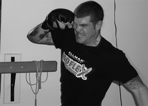 Ben Leuenberger prepares for the Friday night fight at the Suffer System Academy.