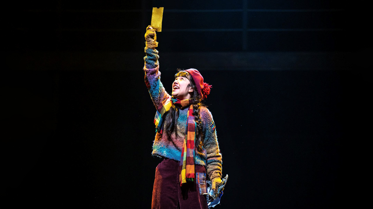 A photo of Neela Noble as Charlie Bucket in Charlie and the Chocolate Factory.