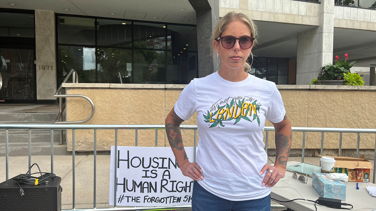 Dr. Andrea Sereda stands in front of City Hall